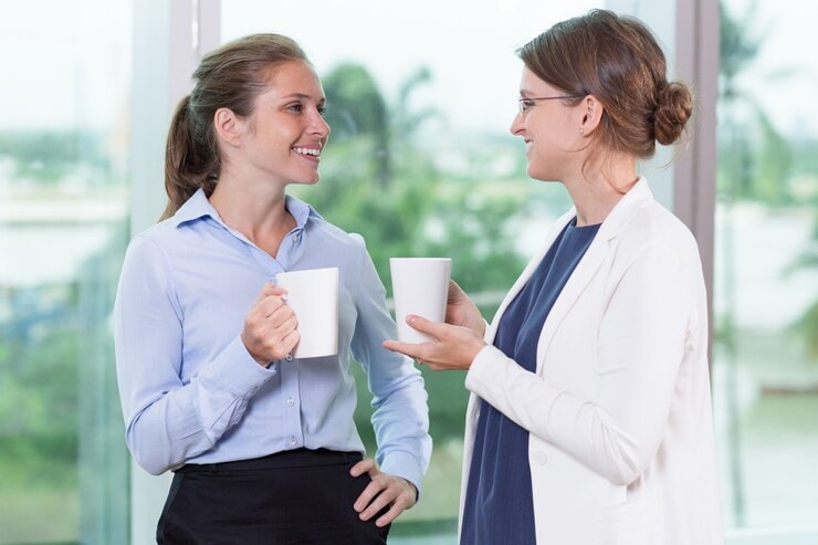 Women drinking coffee talking
